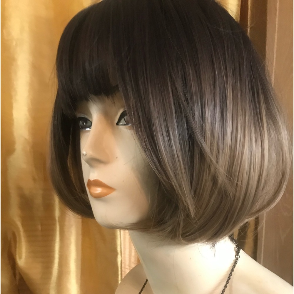 Synthetic Brown w/ highlights wig in a Bob style